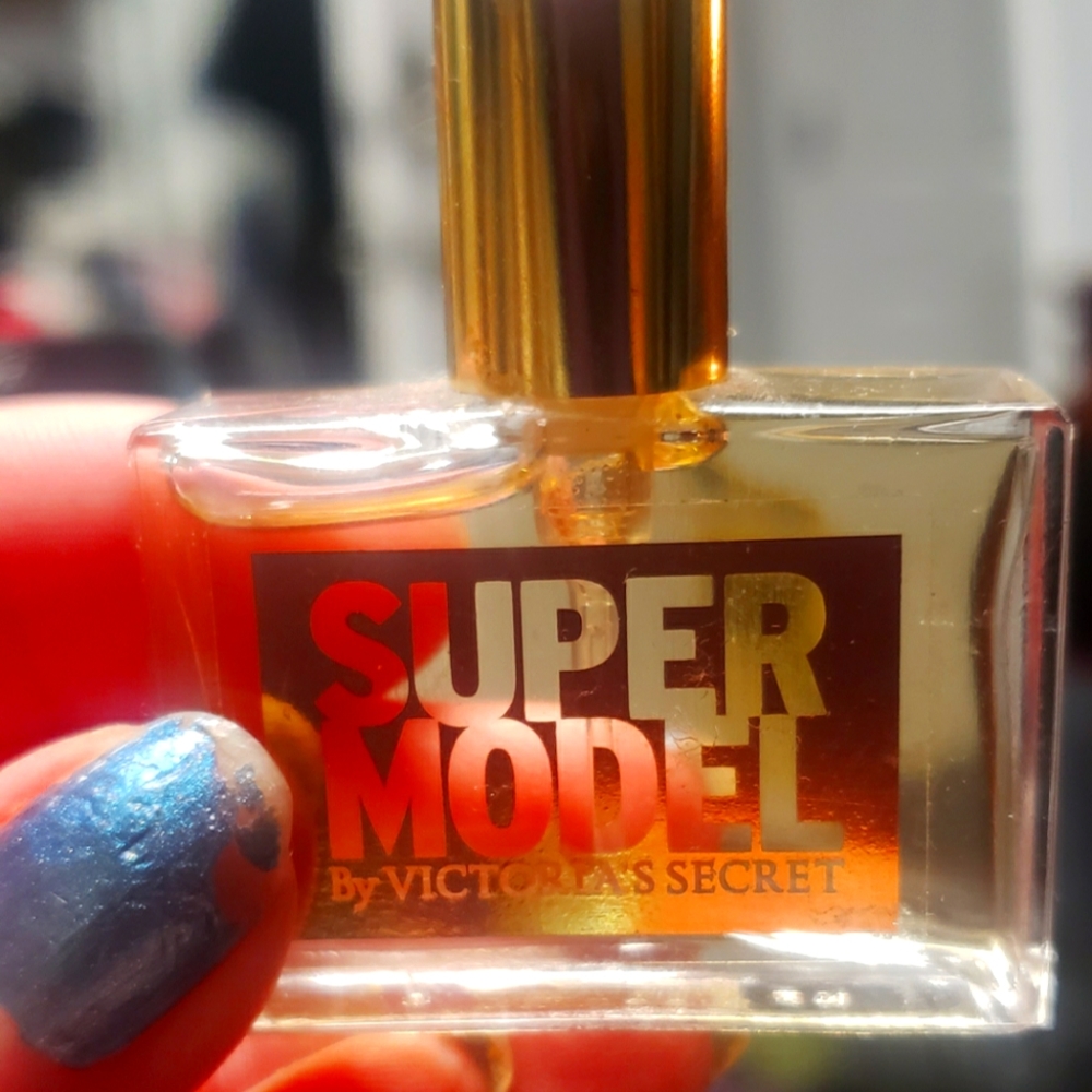 Victoria secrets mini purse size super model perfume..new